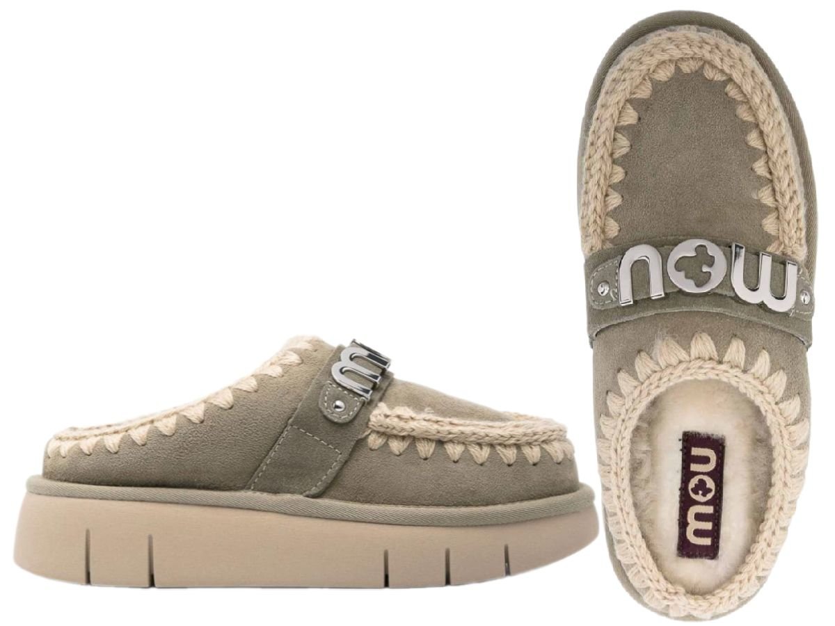 MOU Bounce Clog Metal Logo Slippers with plush materials and chunky sole, offering cozy warmth and luxury. Available at The B Store.